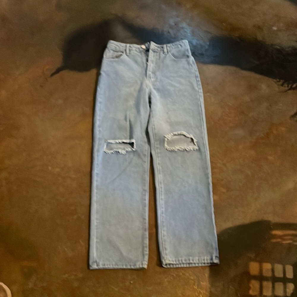 Ripped at the knees blue jeans Never Worn